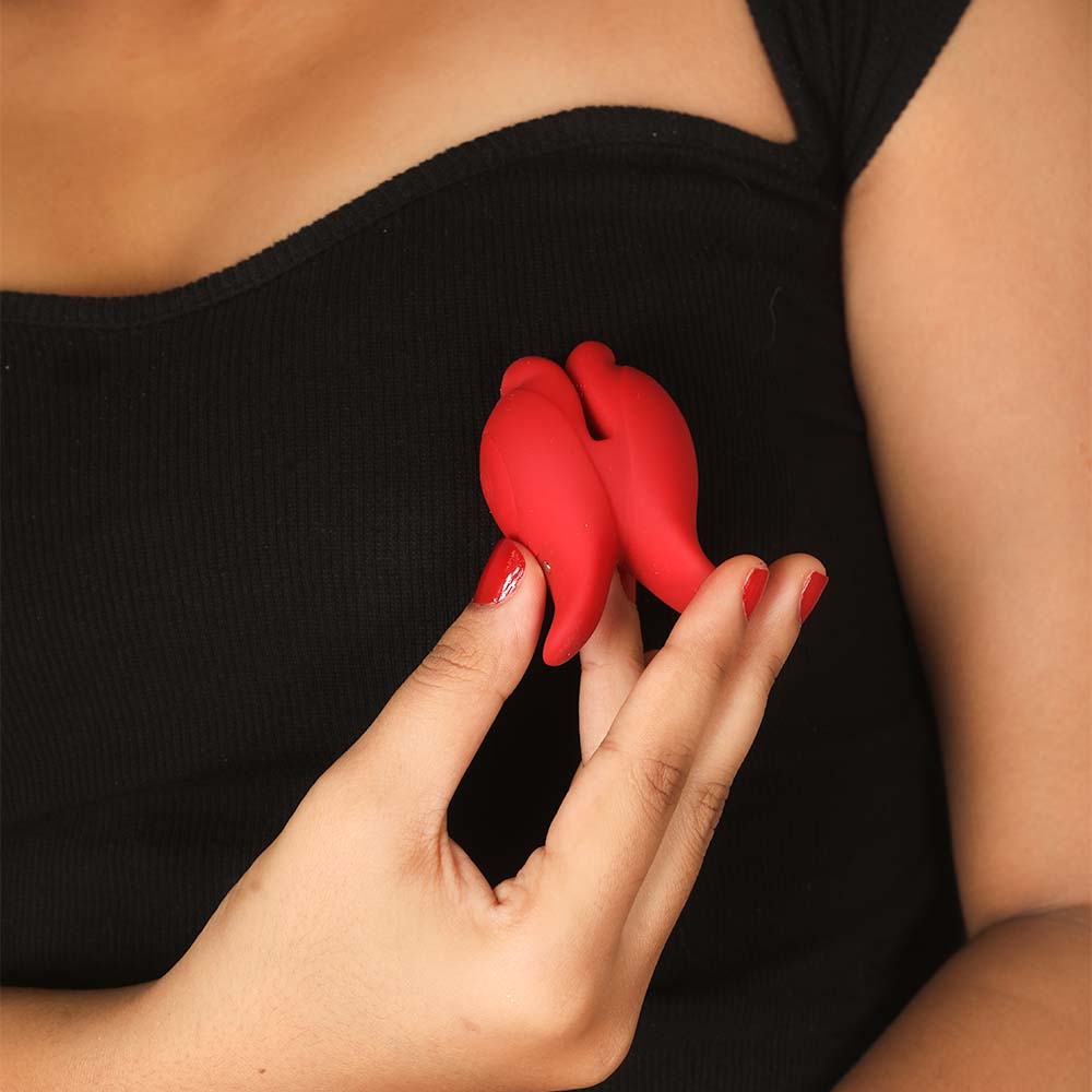 Fish-shaped nipple massager with soft silicone tips for gentle stimulation