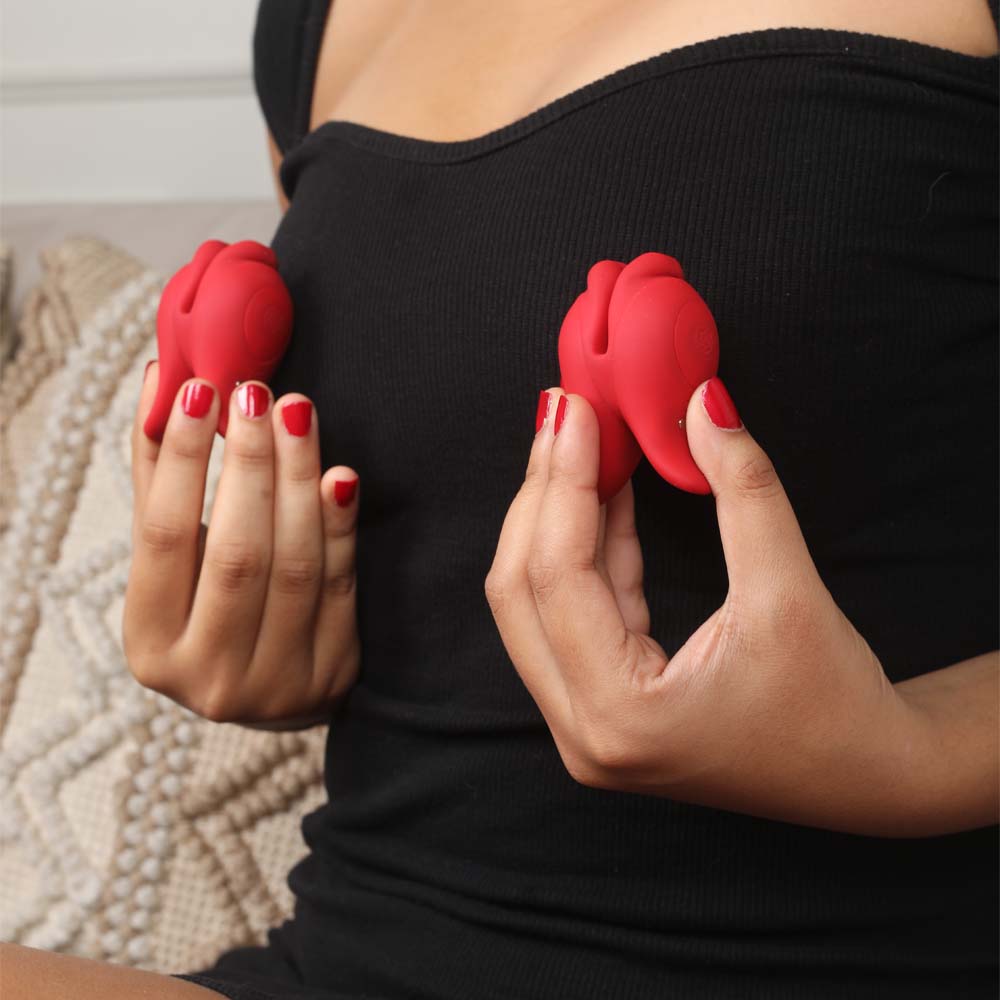 Fish-shaped nipple massager with soft silicone tips for gentle stimulation