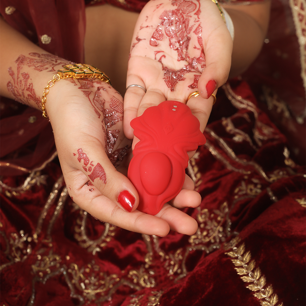 Rechargeable butterfly massager with flexible silicone body and wireless control