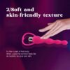 "Beaded silicone massager tool with smooth contours for targeted stimulation."