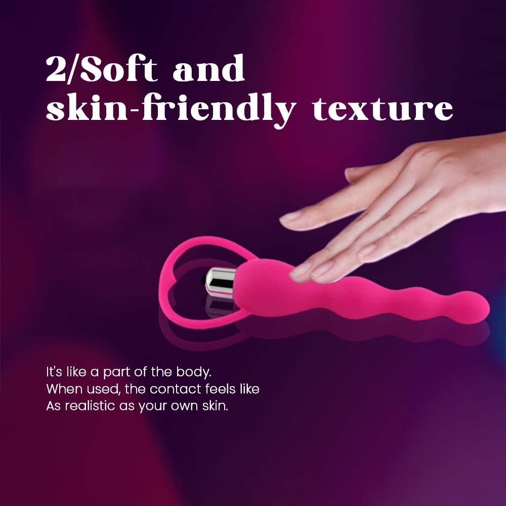 "Beaded silicone massager tool with smooth contours for targeted stimulation."