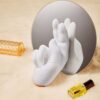 "USB-rechargeable Golden Right Hand massager with realistic hand-like movement."